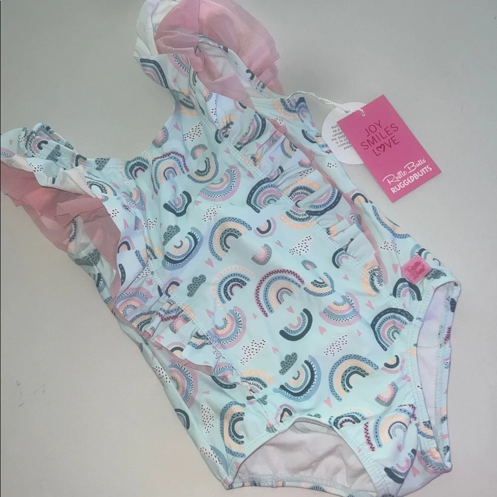 NWT RuffleButts Chase The Rainbow Waterfall Girls One Piece Swimsuit- back bow